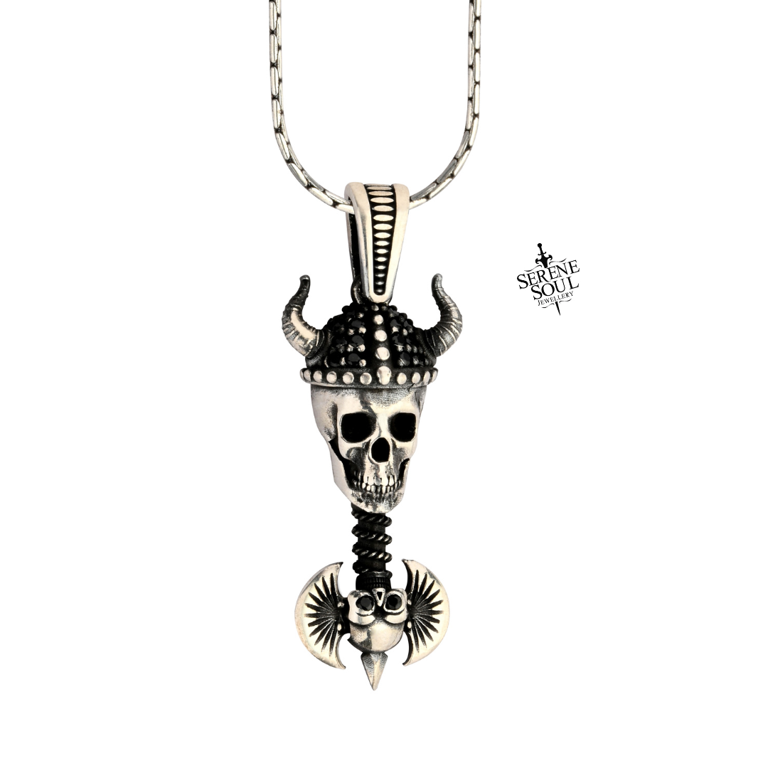 Skull pendant necklace with decorative elements on a white background
