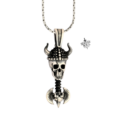 Skull pendant necklace with decorative elements on a white background
