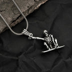 Skeleton pendant on a chain against a dark textured background