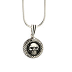 Skull pendant necklace on a white background